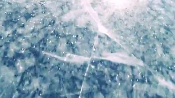 Surface Pond Ice Skate Marks Cracks Bubbles Reflects Spring Sun — Stock Video