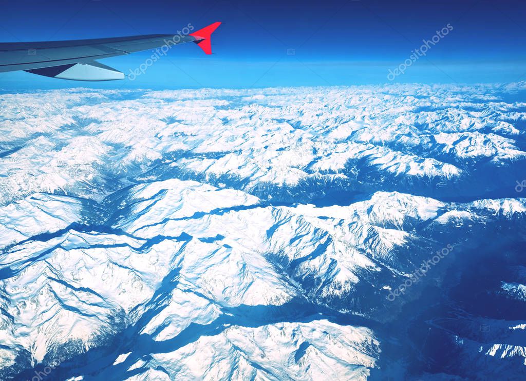 Window seat view over Switzerland, Italy and Austria 