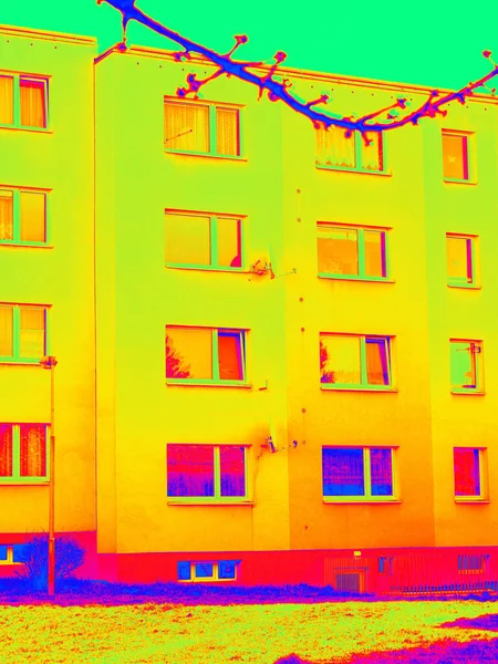 Energy waste. Traditional concrete building in thermography scan.  Infra or thermography photo