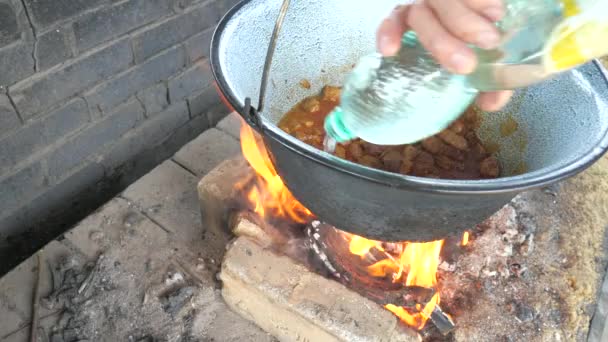 Chef Just Pouring Water Minced Meat Preparation Goulash Outdoor Fireplace — Stock Video