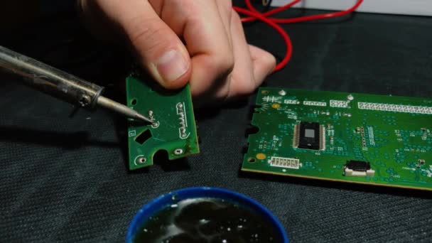 Young Engineer Soldering Board Close — Stock Video