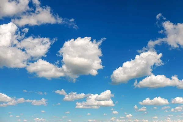 Blue sky with fluffy clouds as background — Stock Photo, Image