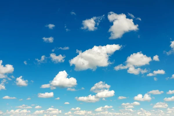 Blue sky with fluffy clouds as background — Stock Photo, Image