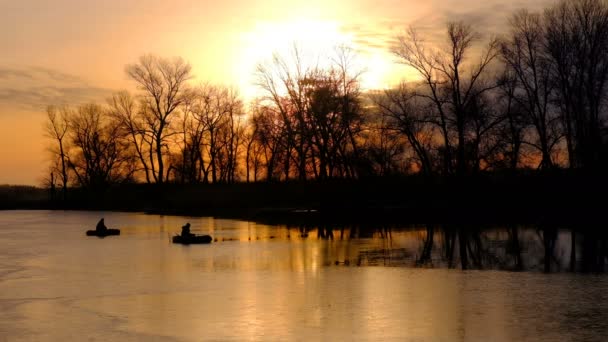Orange Sunrise Lake Fishermen Boats Winter Time — Stock Video