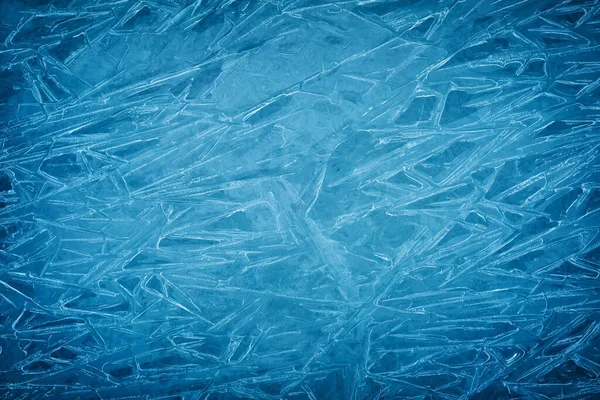 Background of blue cold winter ice. Texture of frozen surface. F — Stockfoto