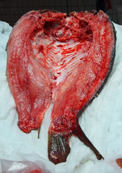 Huge butchered fish on sale in the market.