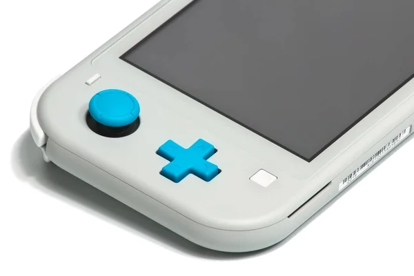 Nintendo Switch And Small Nintendo Switch Lite Comparison Of Two Handheld  Game Consoles Stock Photo - Download Image Now - iStock