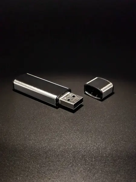 Flash drive, data carrier on a black background