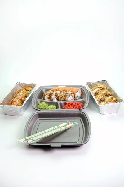 takeaway Lunch, delivery of sushi menu in lunch boxes. The concept of delivery