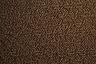 Kahverengi kumaş dokusu. Yünden yapılmış ürünler. El işi