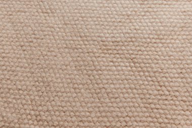 Kalıplı bej yün kumaş. El işi.