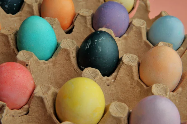 Plenty of painted eggs lie on the pink premise for the Easter holiday.