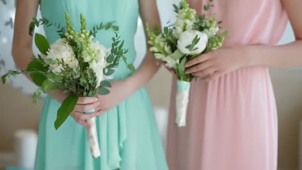 Beautiful bridesmaids with flowers — Stock Video