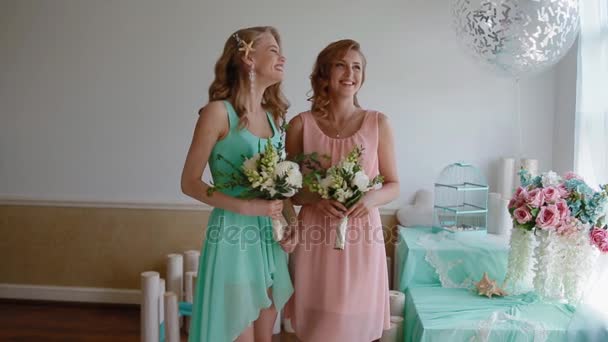 Beautiful bridesmaids with flowers — Stock Video
