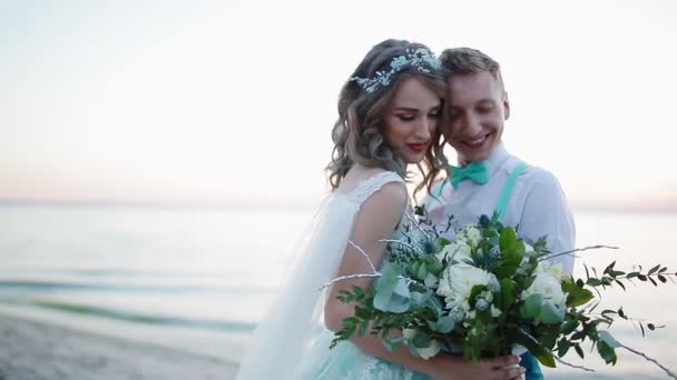 Bride and groom near the sea — Stock Video