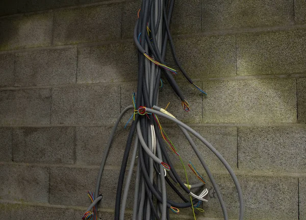 building house electrical wiring in an isolated corrugation