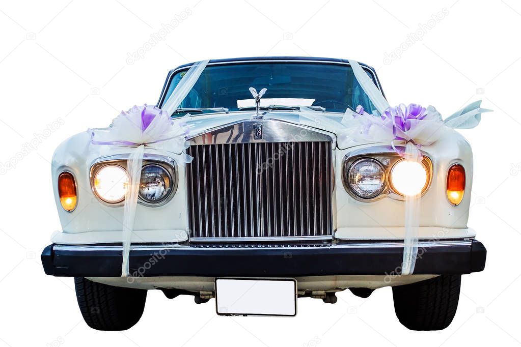 Israel - June 23, 2016: Vintage Rolls Royce wedding car decorated with ribbons .Isolated on white background .
