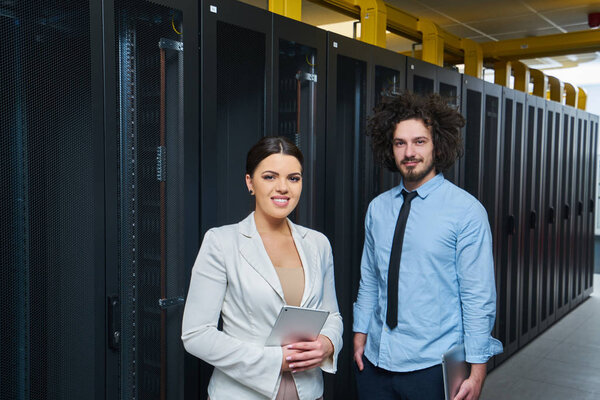 Young technicians working on servers