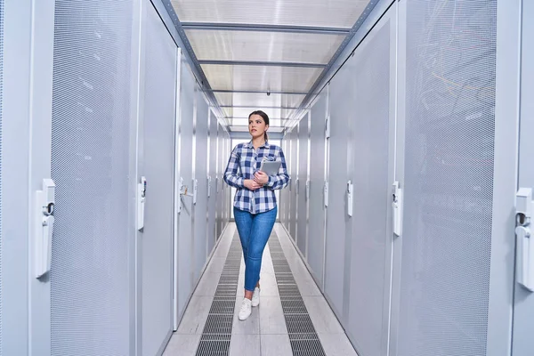 female technician working on server maintenance