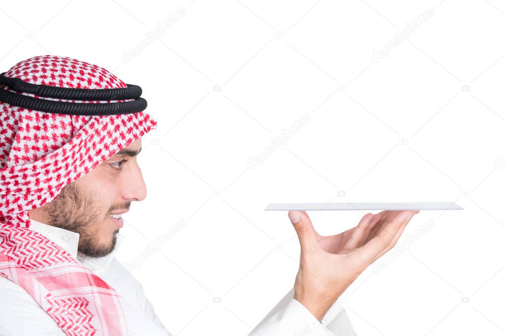 Young muslim man holding something. Perfect for displaying your poroduct. isolated.