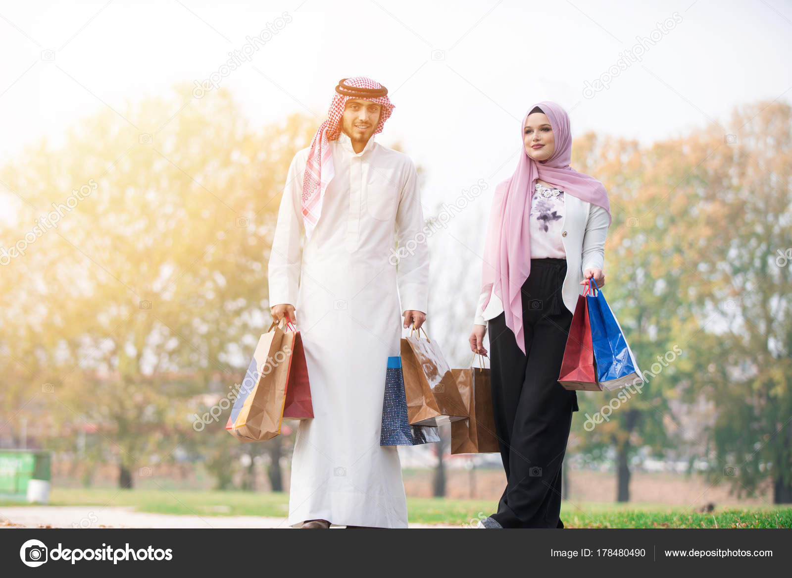 Lovely Muslim Couple Taking Walk Shopping Concept Stock Photo