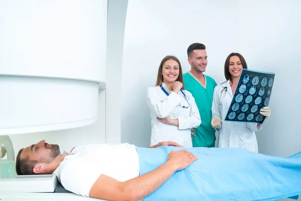Confident Pleasant Doctor Working Mri Scan Results — Stock Photo, Image