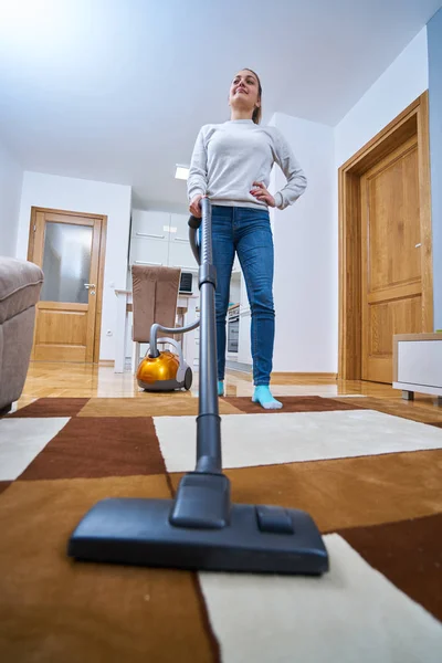 woman who cleans the floor of the house