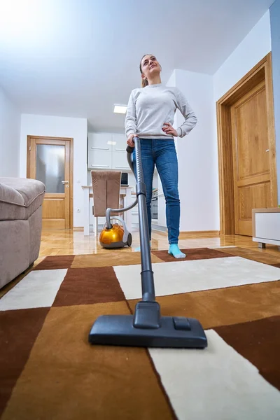 woman who cleans the floor of the house