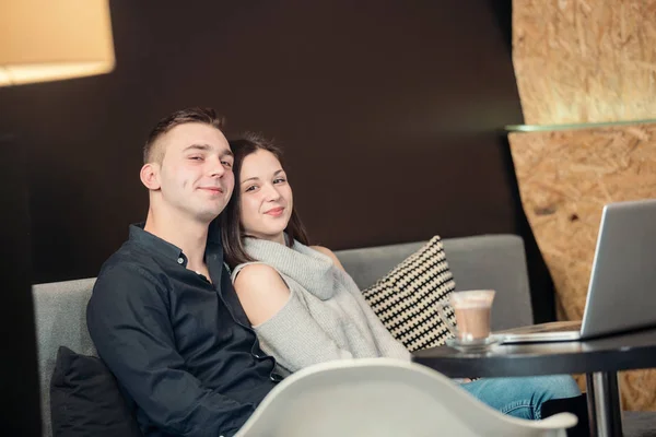 Young couple having fun at a caffe shop. — Stock Photo, Image