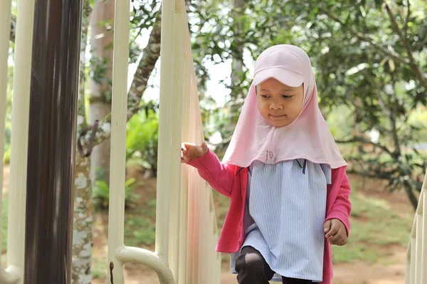 Little cute girl playing at outdoor. Cute girl playing at the weekend — Stock Photo, Image