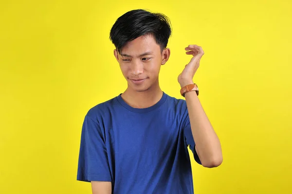 Portrait of happy young Asian man smiling in front of the camera — 스톡 사진