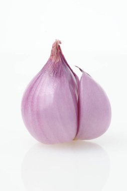 Close up of shallots or Red Spanish onion, isolated on white background clipart