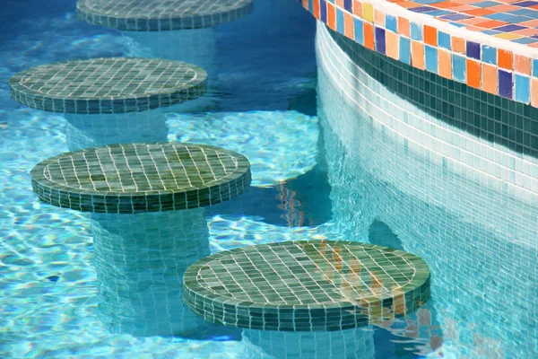 Swimming pool bar stools — Stock Photo, Image