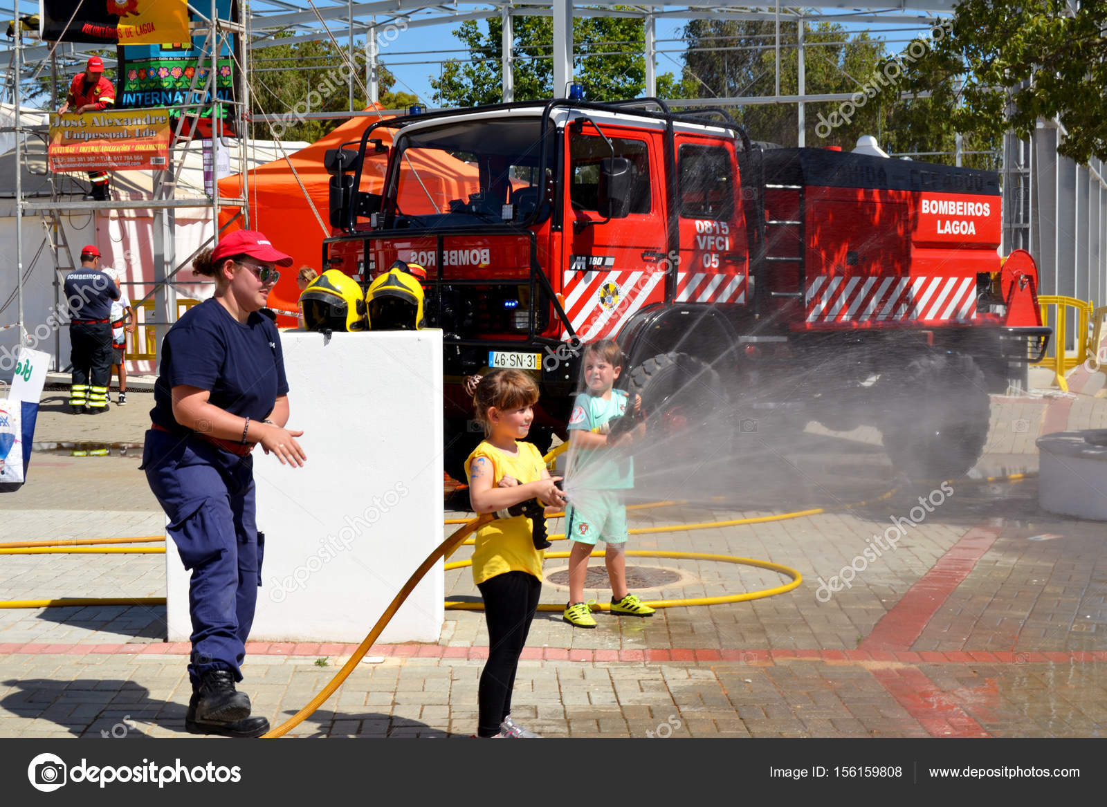 Fire fighting kids. – Stock Editorial Photo © Murdocksimages #156159808