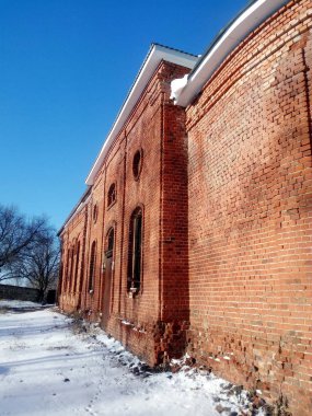 Old red brick church in the village of Kuyman Lebedyansky area