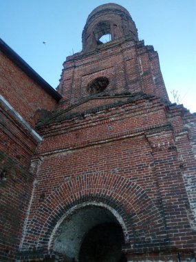 Old red brick church in the village of Kuyman Lebedyansky area