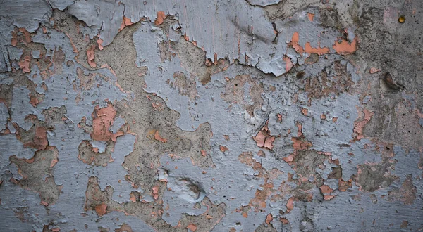 Текстура старой стены, покрытой краской. Фоновое изображение — стоковое фото