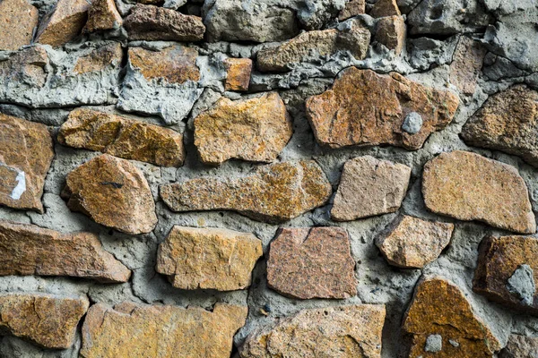 The texture of the old masonry. Background image of a stone-line — Stock Photo, Image