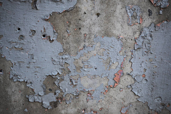 Текстура старой стены, покрытой краской. Фоновое изображение

