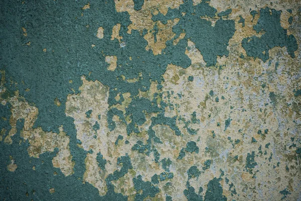 Textura de una vieja pared cubierta de pintura. Imagen de fondo de una —  Fotos de Stock