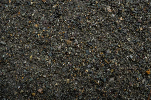 Textura mělkého říčního kamene. Oblázkový obrázek pozadí — Stock fotografie