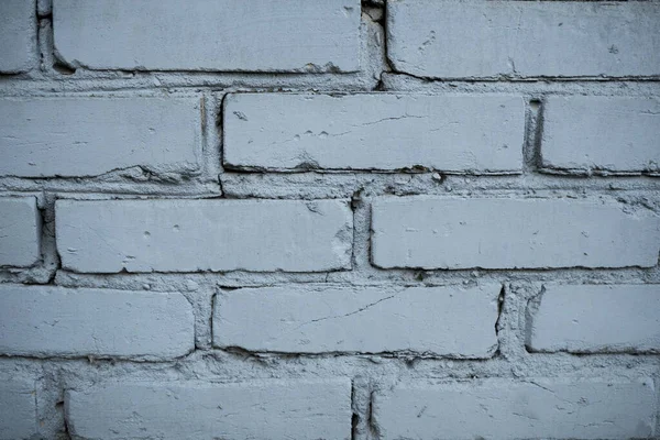 오래된 페인트의 질감은 벽돌 벽을 덮었다. 의 배경 이미지 — 스톡 사진
