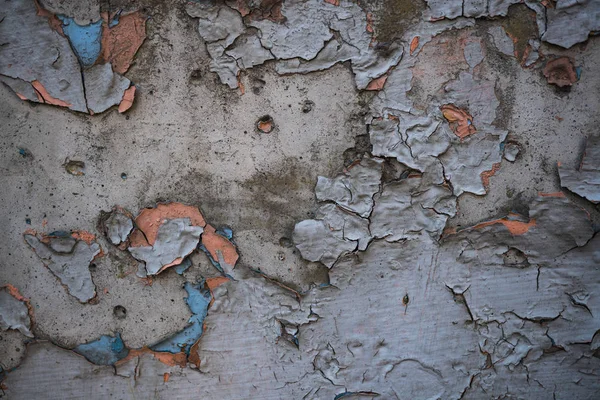 Textuur van een oude muur bedekt met verf. Achtergrondafbeelding van een — Stockfoto