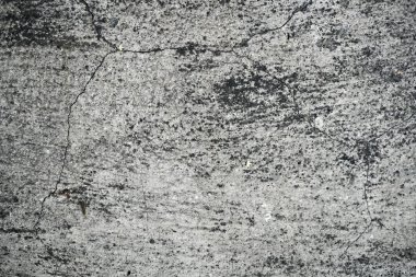 Eski bir çatlak beton duvarın dokusu. W'nin arka plan görüntüsü