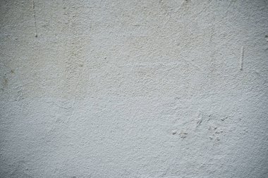 Boya ile kaplı eski bir duvarın dokusu. Yıpranmış boya kaplı yüzeyin arka plan görüntüsü