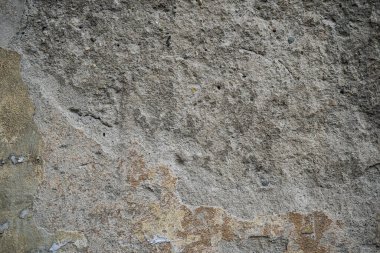 Boya ile kaplı eski bir duvarın dokusu. Yıpranmış boya kaplı yüzeyin arka plan görüntüsü