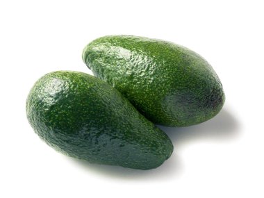 Beyaz arka planda izole bir nesne. Meyve armut biçimli, elipsoidal ve küresel şekilli tek çekirdekli bir meyvedir. Olgun bir sebzenin kabuğu serttir, buruşuktur, koyu yeşildir..
