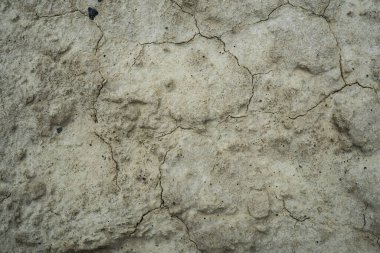 Kurutulmuş çatlak kil dokusu. Kurutulmuş kil makro arka plan görüntüsü