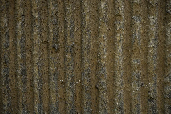 Eski alçının dokusu. Alçı minimalist arka plan görüntüsü. Sıva paralel çizgilerhalinde yapılmış. Metin için boş alan. Ayrıntılı görüntü yakın vurdu. Grafik kaynakları soyut dokulu arka plan.