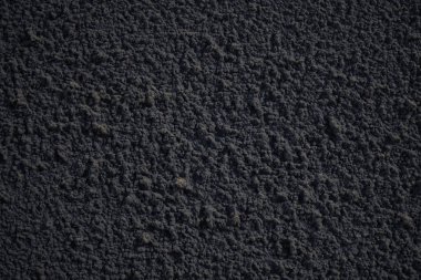 Kabaca boyanmış bir duvarın arkaplan görüntüsü. Sert yüzey dokusu. Dekoratif alçı. Monoton duvar kağıtları. İç mekan için malzeme bitiriyorum. Neme dayanıklı, yıkanabilir kaplama..